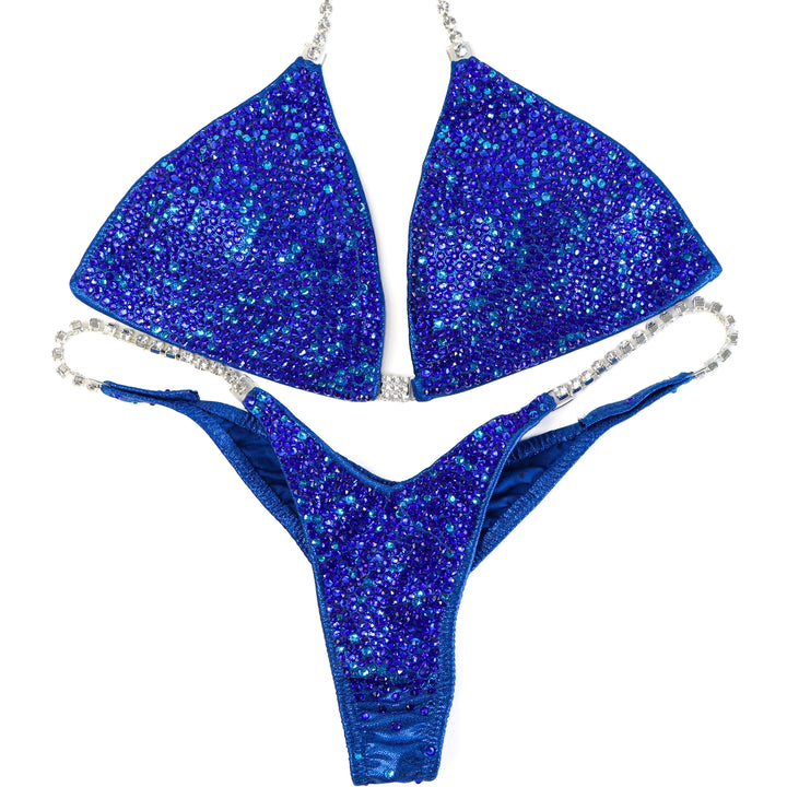 QS ST: Dazzlebolt Blue Radiance. Medium/Wellness Pro.  Angel Competition BikinisThe best NPC Competition Suits for the Bikini Division, Fit Model Division Suits, and bodybuilding suits.