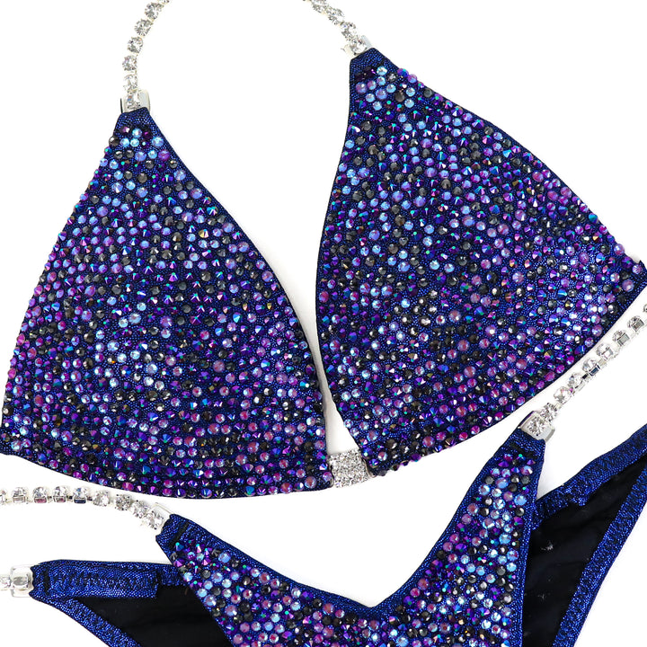 QS ST: Blueberry Burgundy Radiance. Small Molded/Wellness Brazilian, Modest Rise.  Angel Competition BikinisThe best NPC Competition Suits for the Bikini Division, Fit Model Division Suits, and bodybuilding suits.