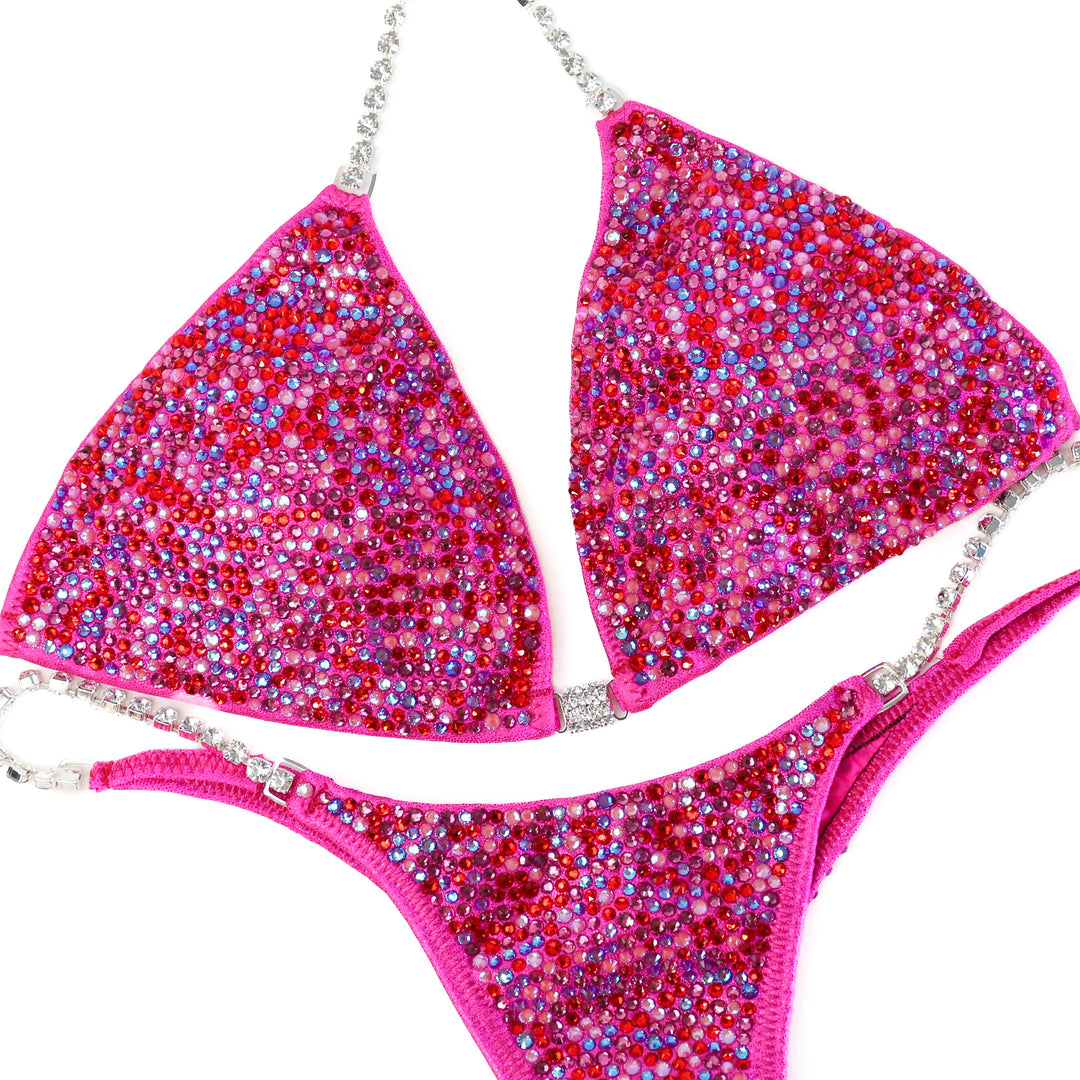 QS ST: Julia's Fuchsia Candy Radiance. Medium/Micro with Petite Rise.  Angel Competition BikinisThe best NPC Competition Suits for the Bikini Division, Fit Model Division Suits, and bodybuilding suits.