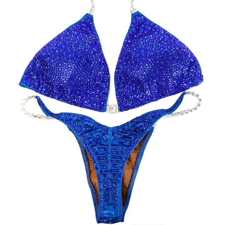 QS ST: True Blue Radiance. Large/Pro with Modest Rise.  Angel Competition BikinisThe best NPC Competition Suits for the Bikini Division, Fit Model Division Suits, and bodybuilding suits.