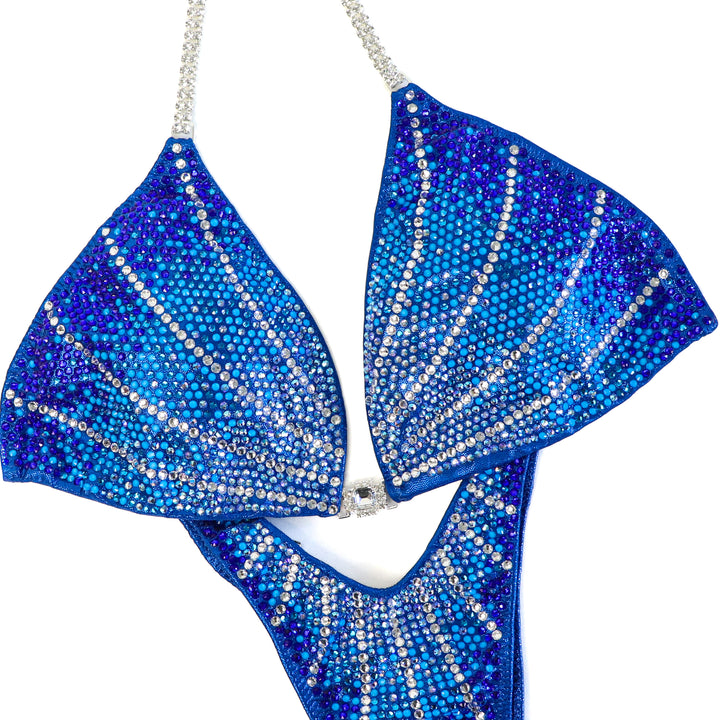 QS ST: Crystal Galaxy. Hologram Blue. Extra Large/Standard Figure.  Angel Competition BikinisThe best NPC Competition Suits for the Bikini Division, Fit Model Division Suits, and bodybuilding suits.
