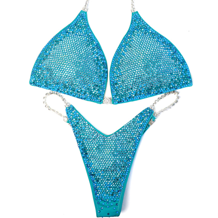 Pre Owned: Matte Aqua Glow Nova. Large/Micro, Modest Rise.  Angel Competition BikinisThe best NPC Competition Suits for the Bikini Division, Fit Model Division Suits, and bodybuilding suits.