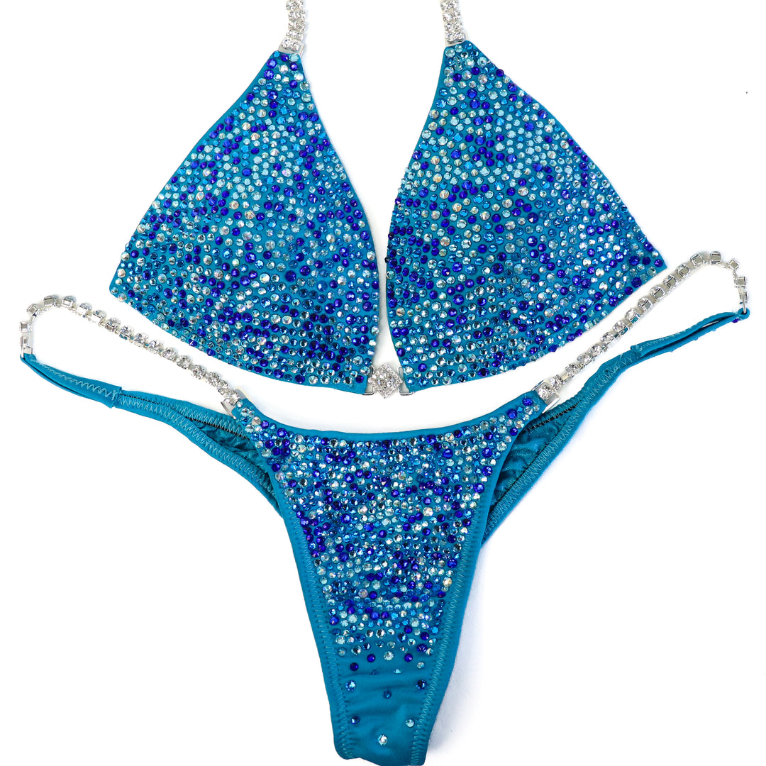 QS ST: Tamekia's Aqua Arnold Radiance. Small Molded/Pro.  Angel Competition BikinisThe best NPC Competition Suits for the Bikini Division, Fit Model Division Suits, and bodybuilding suits.