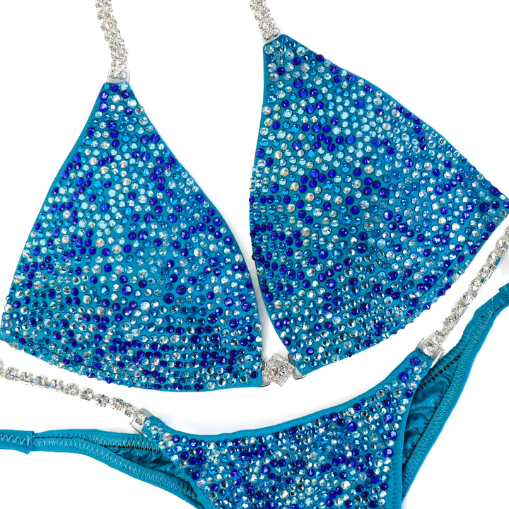 QS ST: Tamekia's Aqua Arnold Radiance. Small Molded/Pro.  Angel Competition BikinisThe best NPC Competition Suits for the Bikini Division, Fit Model Division Suits, and bodybuilding suits.