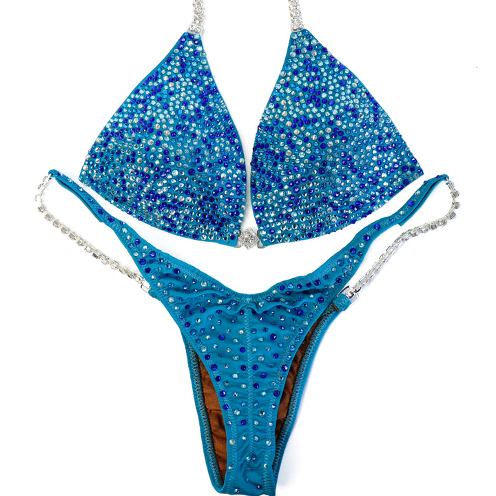 QS ST: Tamekia's Aqua Arnold Radiance. Small Molded/Pro.  Angel Competition BikinisThe best NPC Competition Suits for the Bikini Division, Fit Model Division Suits, and bodybuilding suits.