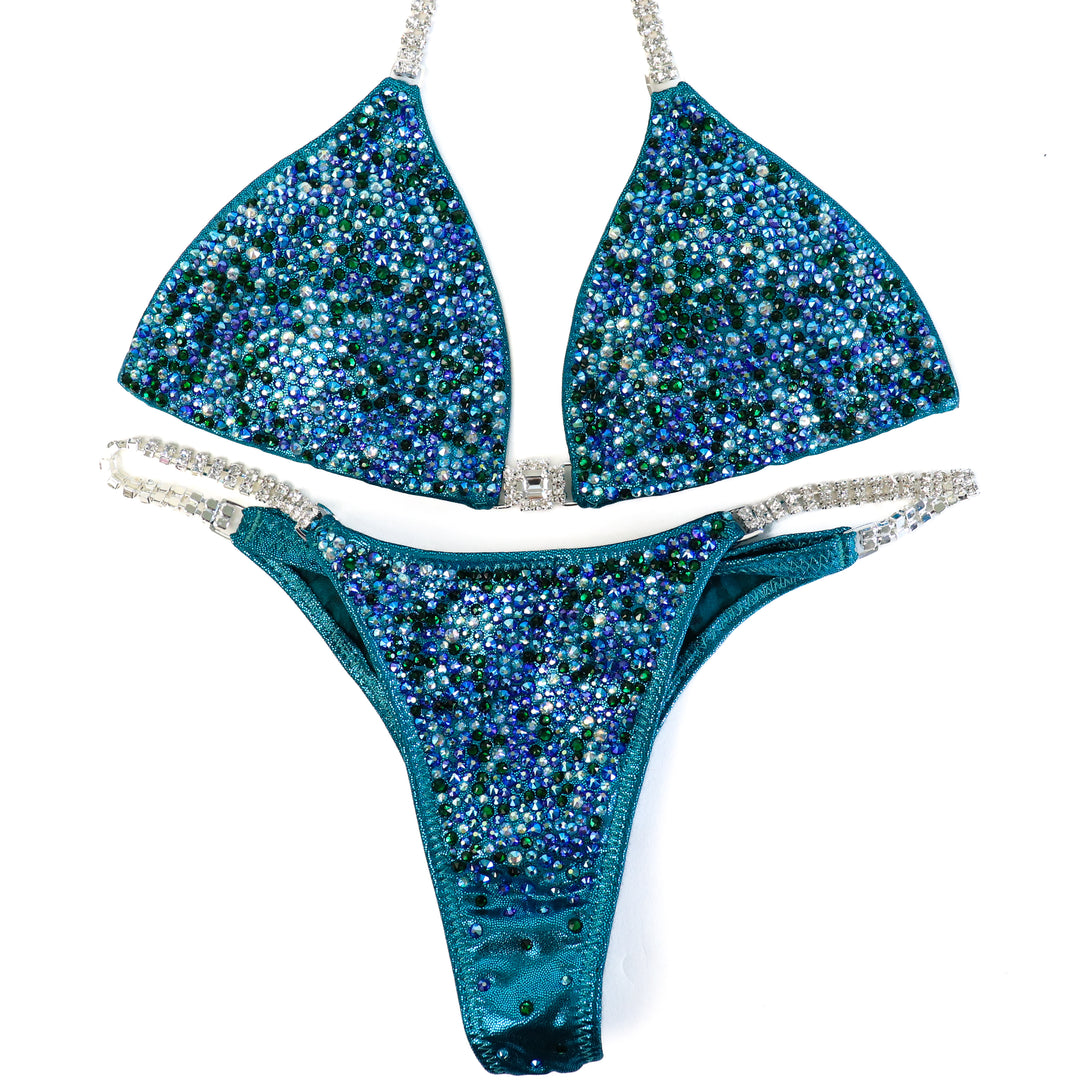 QS ST: Triumphant Teal Radiance. Small/Pro  Angel Competition BikinisThe best NPC Competition Suits for the Bikini Division, Fit Model Division Suits, and bodybuilding suits.