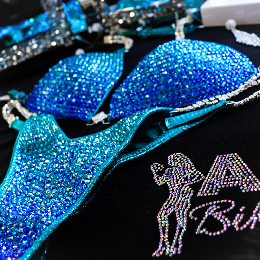 Deb's Tropical Teal Gradient  Angel Competition BikinisThe best NPC Competition Suits for the Bikini Division, Fit Model Division Suits, and bodybuilding suits.