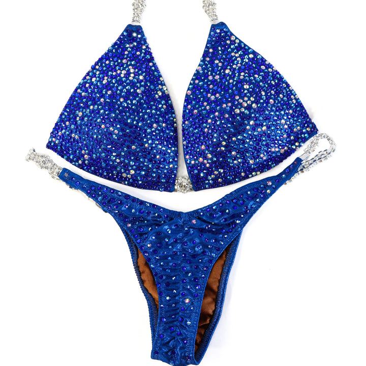 QS ST: Crystal Azure Radiance. Medium Molded/Pro with Modest Rise.  Angel Competition BikinisThe best NPC Competition Suits for the Bikini Division, Fit Model Division Suits, and bodybuilding suits.