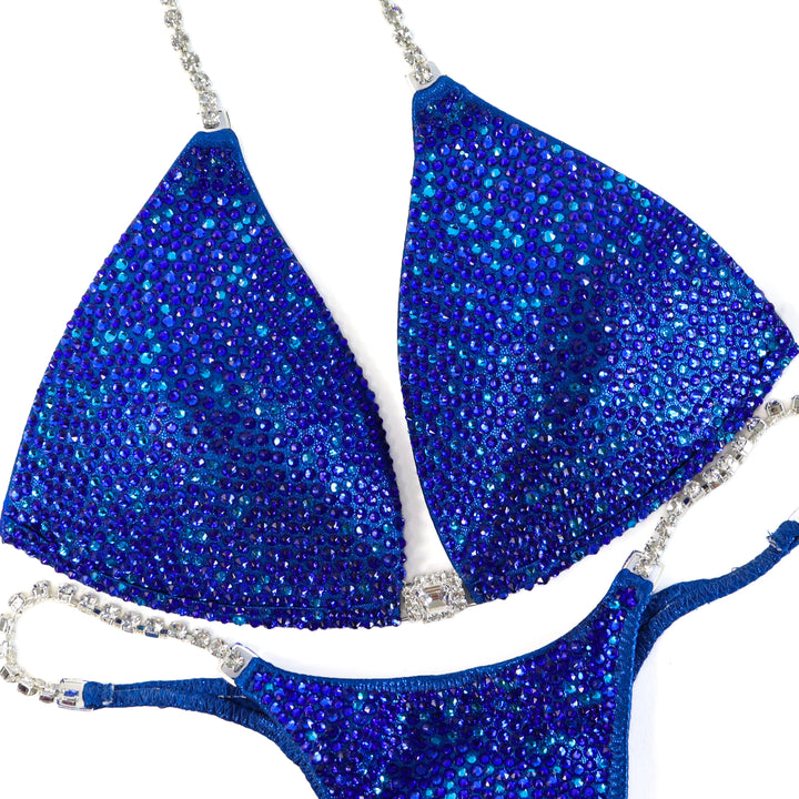 QS ST: Dazzlebolt Blue Radiance. Medium Molded/Micro.  Angel Competition BikinisThe best NPC Competition Suits for the Bikini Division, Fit Model Division Suits, and bodybuilding suits.