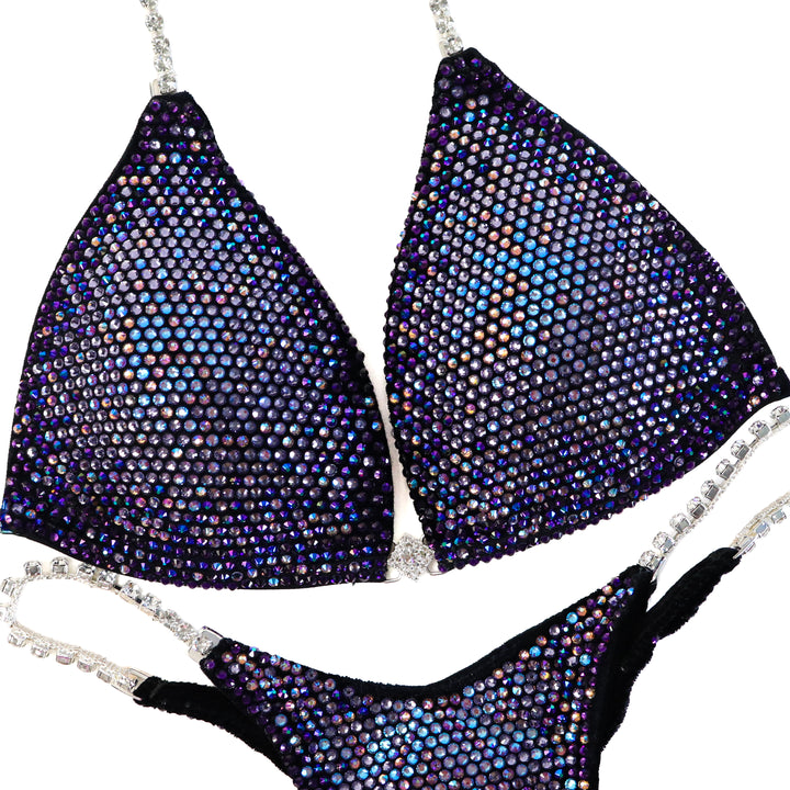 Pre Owned: Velvet Amethyst Glow. Medium Molded/Micro.  Angel Competition BikinisThe best NPC Competition Suits for the Bikini Division, Fit Model Division Suits, and bodybuilding suits.