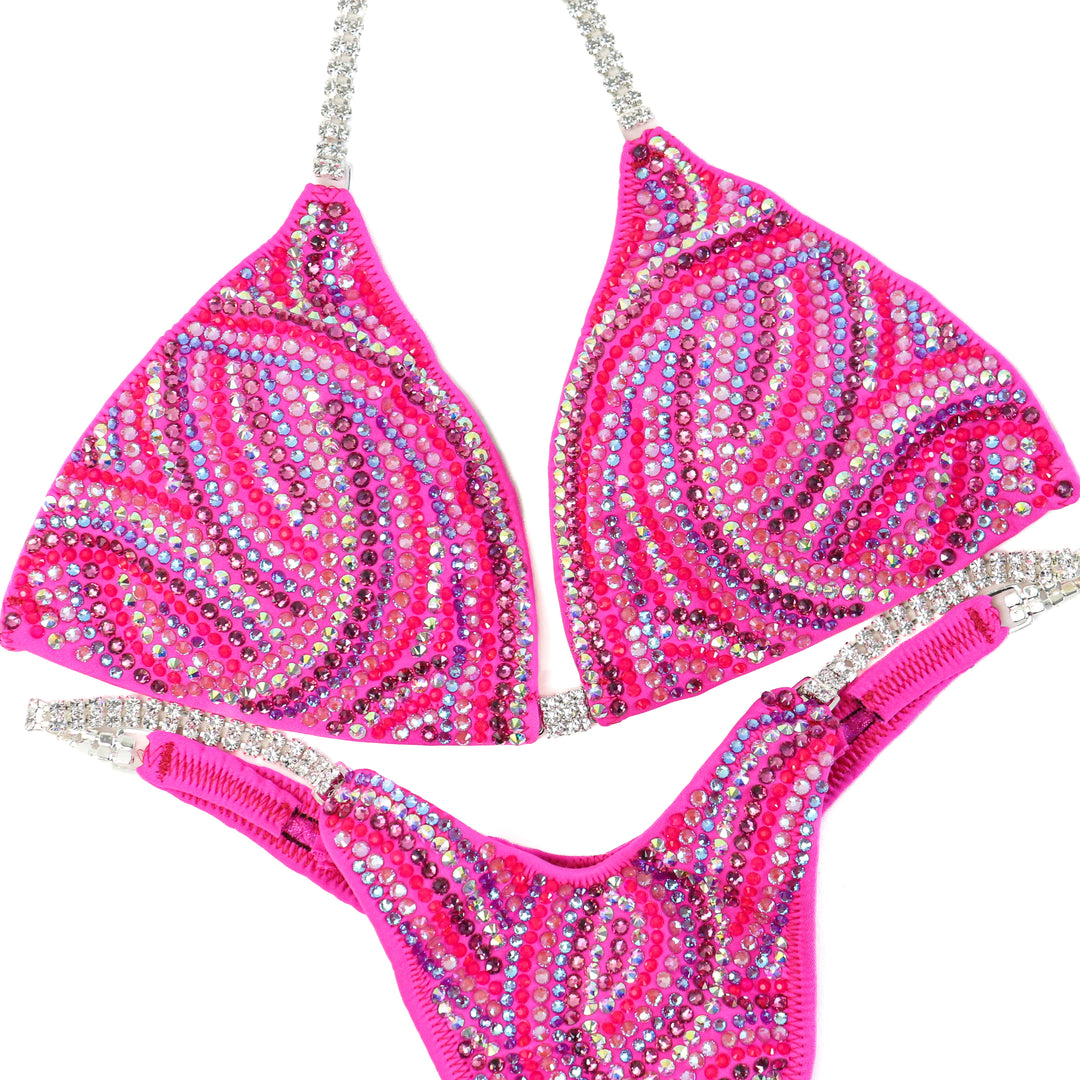 QS ST: Hot Pink Swirl. Medium/Slim Figure.  Angel Competition BikinisThe best NPC Competition Suits for the Bikini Division, Fit Model Division Suits, and bodybuilding suits.