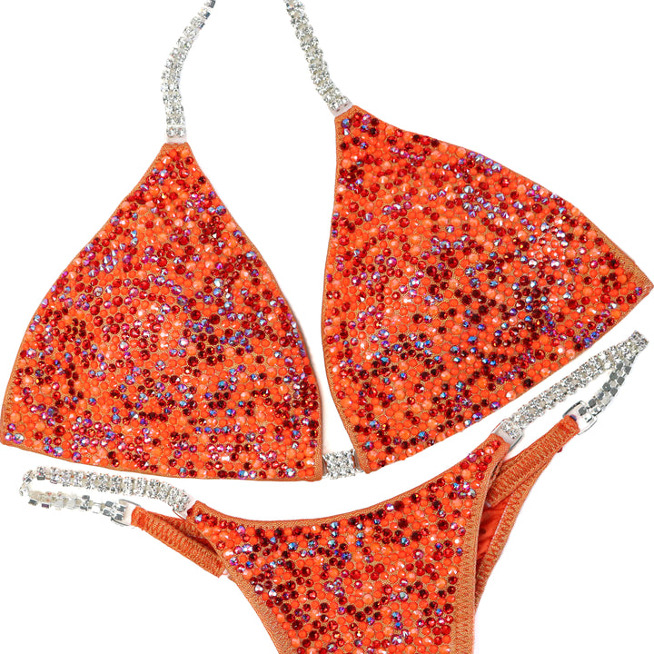 QS ST: Orange Red Radiance. Medium/Pro.  Angel Competition BikinisThe best NPC Competition Suits for the Bikini Division, Fit Model Division Suits, and bodybuilding suits.