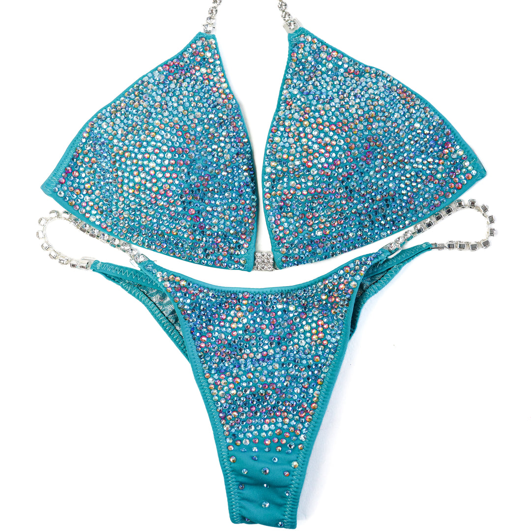 QS ST: Aqua Rainbow Radiance. Medium/Pro, Modest Rise.  Angel Competition BikinisThe best NPC Competition Suits for the Bikini Division, Fit Model Division Suits, and bodybuilding suits.