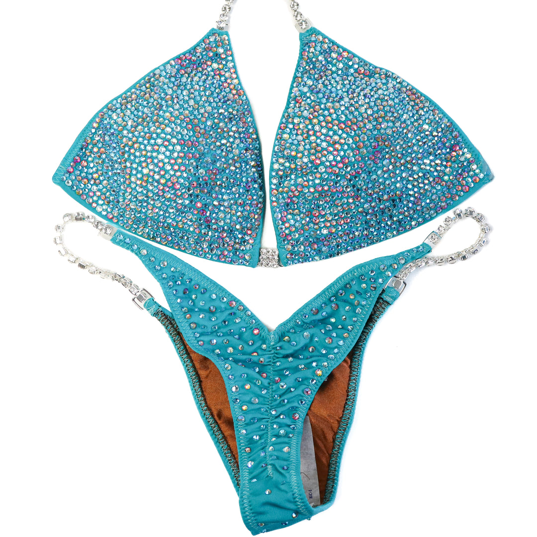 QS ST: Aqua Rainbow Radiance. Medium/Pro, Modest Rise.  Angel Competition BikinisThe best NPC Competition Suits for the Bikini Division, Fit Model Division Suits, and bodybuilding suits.