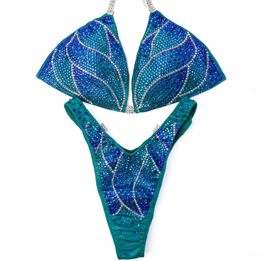 QS CL: Crystal Nebula. Hologram Electric Green. Medium/Standard Figure.  Angel Competition BikinisThe best NPC Competition Suits for the Bikini Division, Fit Model Division Suits, and bodybuilding suits.