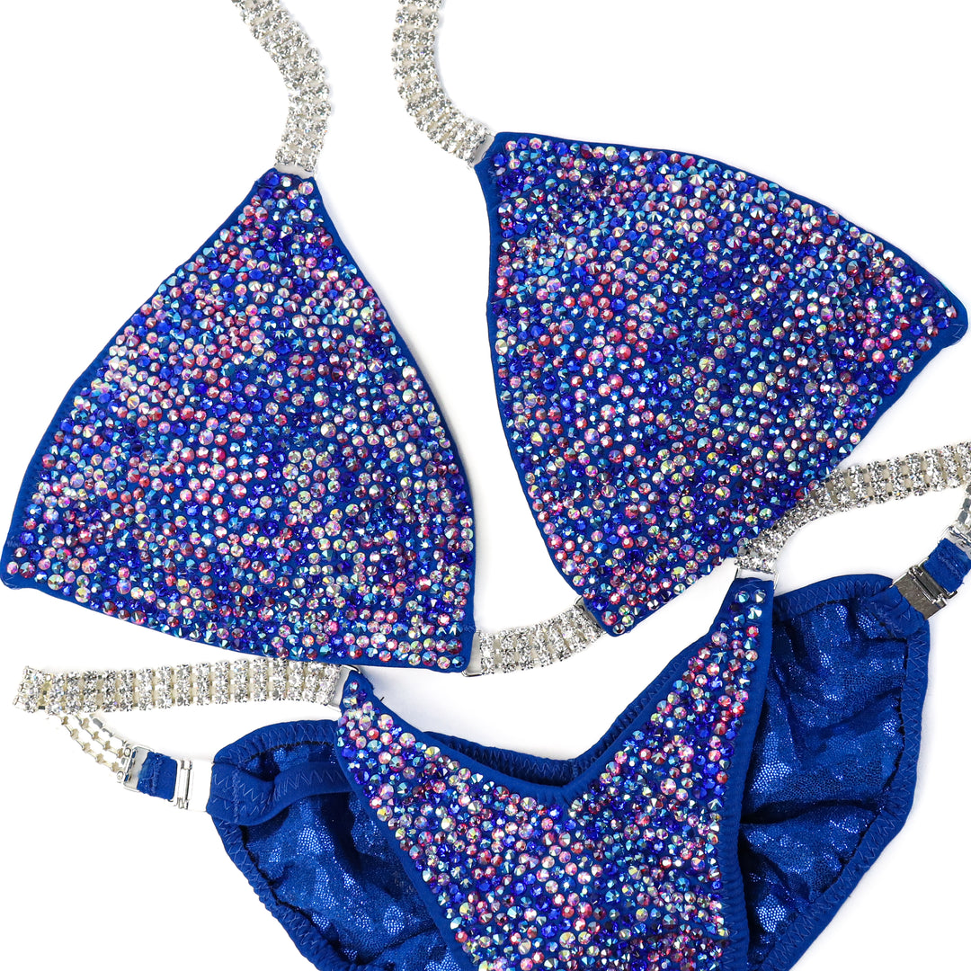 QS ST: Crystal Radiance. Matte Royal. Medium/Moderate, Modest Rise.  Angel Competition BikinisThe best NPC Competition Suits for the Bikini Division, Fit Model Division Suits, and bodybuilding suits.