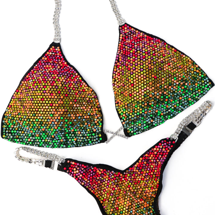 Pre Owned: Neon Glow Gradient. Large/Pro, Modest Rise.  Angel Competition BikinisThe best NPC Competition Suits for the Bikini Division, Fit Model Division Suits, and bodybuilding suits.