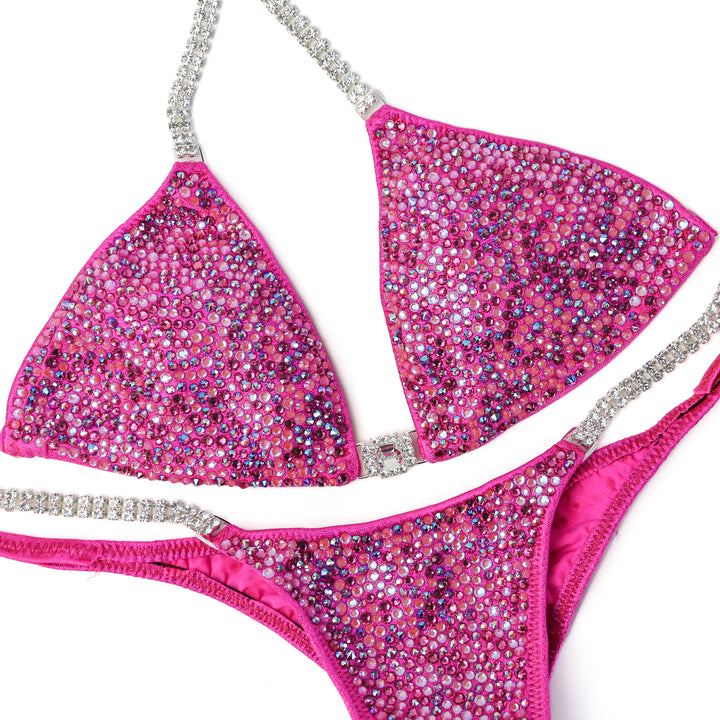QS ST: Crystal Radiance. Hologram Pink. Small/Pro.  Angel Competition BikinisThe best NPC Competition Suits for the Bikini Division, Fit Model Division Suits, and bodybuilding suits.
