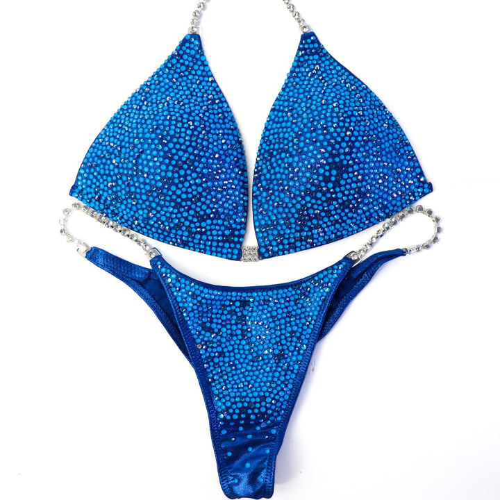 QS ST:  Blue Lagoon Radiance. Large/Pro, Modest Rise.  Angel Competition BikinisThe best NPC Competition Suits for the Bikini Division, Fit Model Division Suits, and bodybuilding suits.
