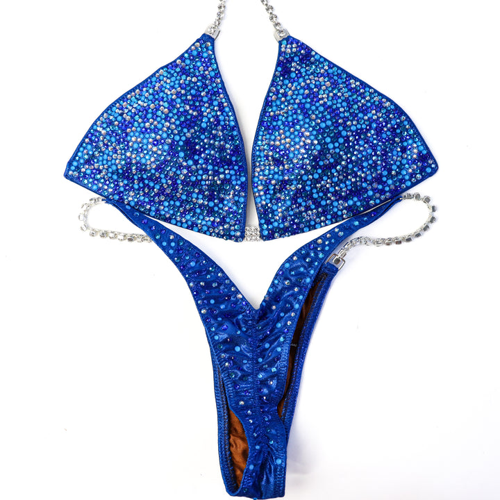 QS ST: Neon Blue Horizon Radiance. Medium/Wellness Micro.  Angel Competition BikinisThe best NPC Competition Suits for the Bikini Division, Fit Model Division Suits, and bodybuilding suits.