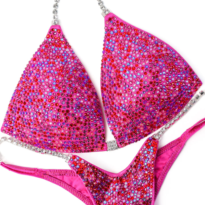 QS ST: Julia's Fuchsia Candy Radiance. Medium Molded/Wellness Pro.  Angel Competition BikinisThe best NPC Competition Suits for the Bikini Division, Fit Model Division Suits, and bodybuilding suits.