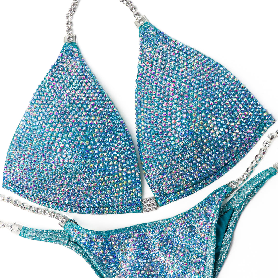 QS ST: Aqua Prism Pro. Medium Molded/Pro, Modest Rise.  Angel Competition BikinisThe best NPC Competition Suits for the Bikini Division, Fit Model Division Suits, and bodybuilding suits.
