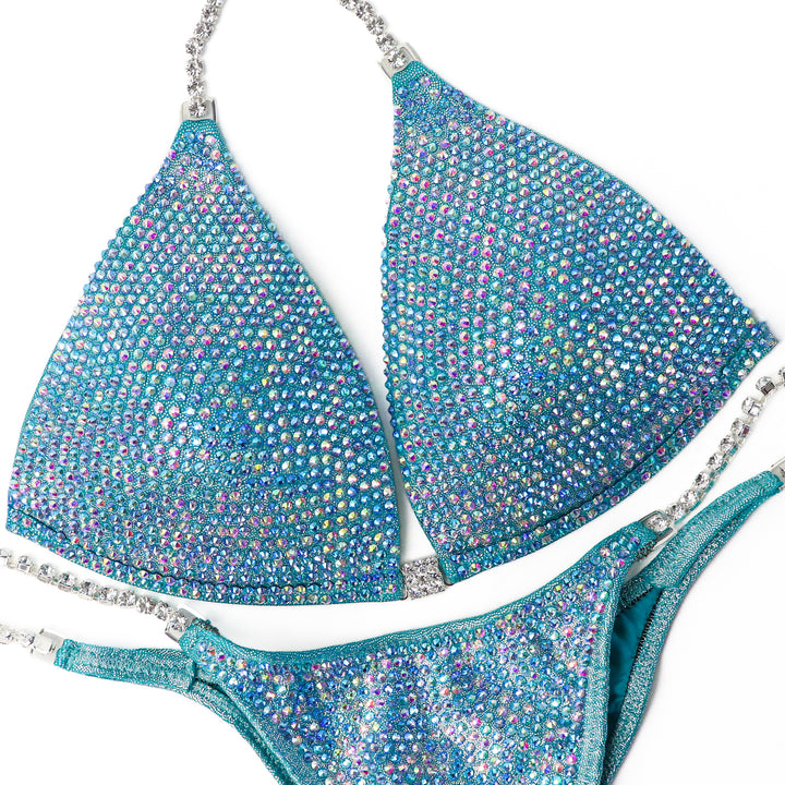 QS ST: Aqua Prism Pro. Medium Molded/Pro, Modest Rise.  Angel Competition BikinisThe best NPC Competition Suits for the Bikini Division, Fit Model Division Suits, and bodybuilding suits.