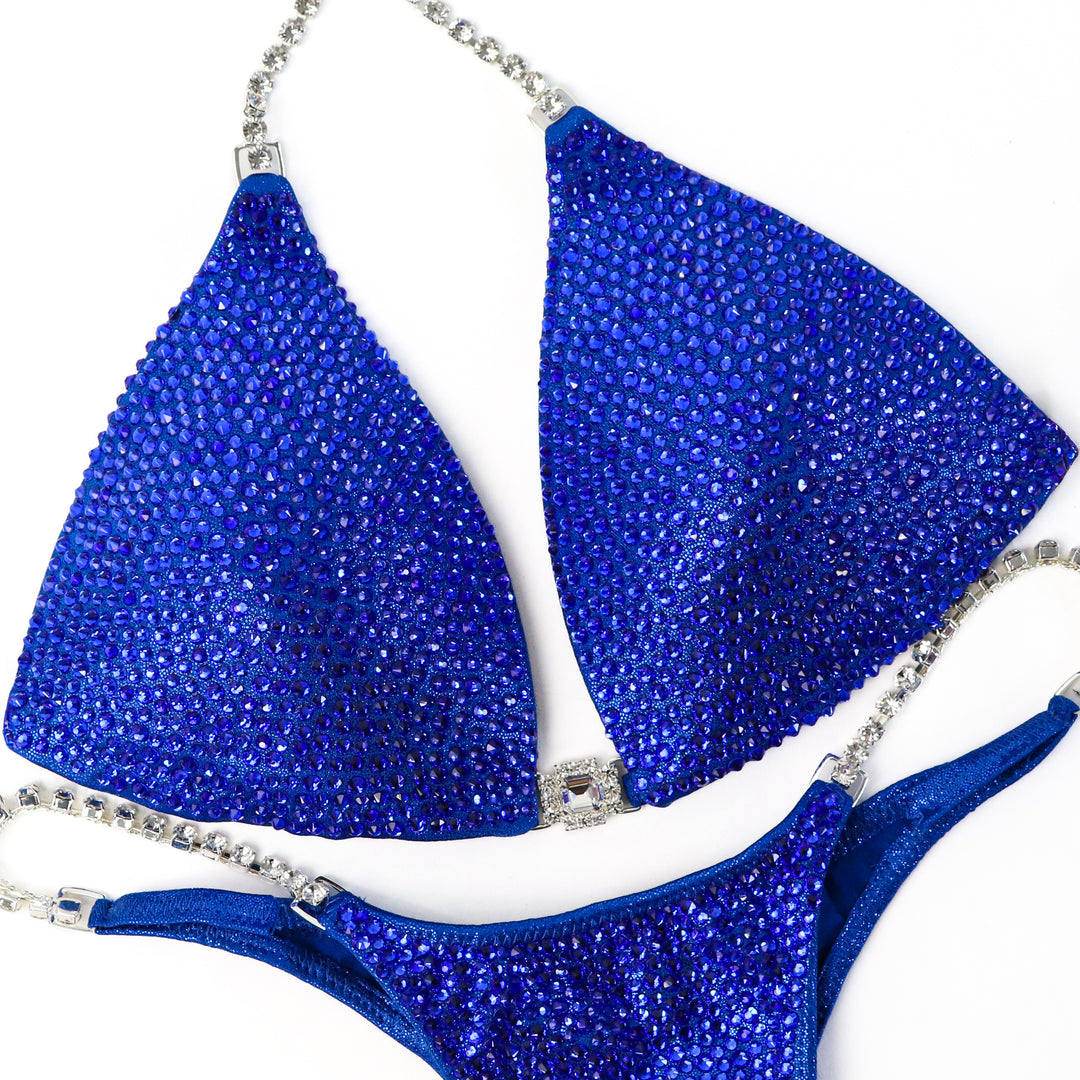 QS ST: True Blue Radiance. Medium Molded/Micro.  Angel Competition BikinisThe best NPC Competition Suits for the Bikini Division, Fit Model Division Suits, and bodybuilding suits.