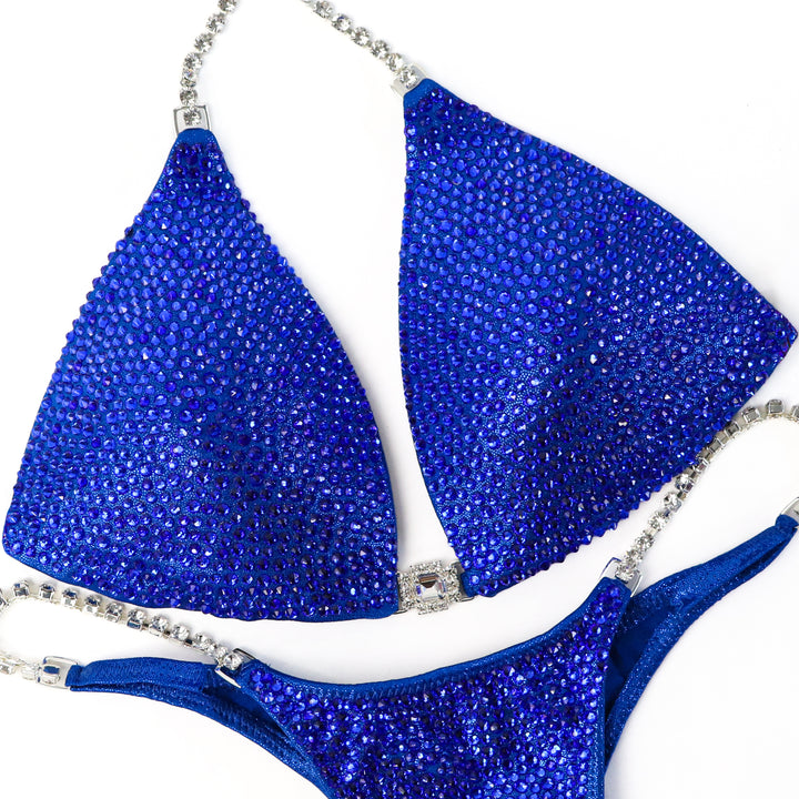 QS ST: True Blue Radiance. Medium Molded/Micro.  Angel Competition BikinisThe best NPC Competition Suits for the Bikini Division, Fit Model Division Suits, and bodybuilding suits.