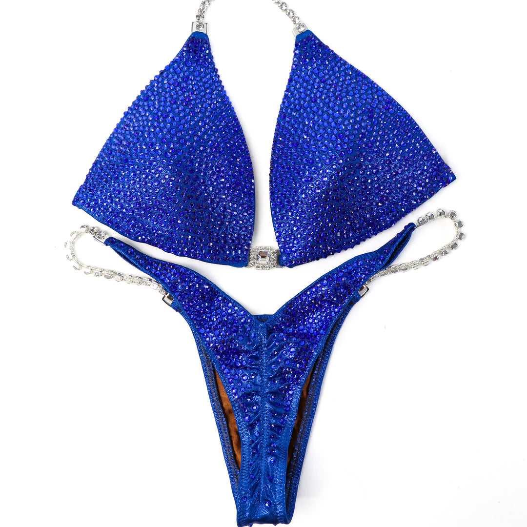 QS ST: True Blue Radiance. Medium Molded/Micro.  Angel Competition BikinisThe best NPC Competition Suits for the Bikini Division, Fit Model Division Suits, and bodybuilding suits.