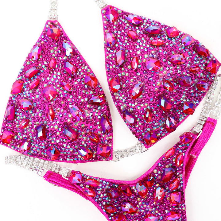 Pink Platinum Radiance  Angel Competition BikinisThe best NPC Competition Suits for the Bikini Division, Fit Model Division Suits, and bodybuilding suits.