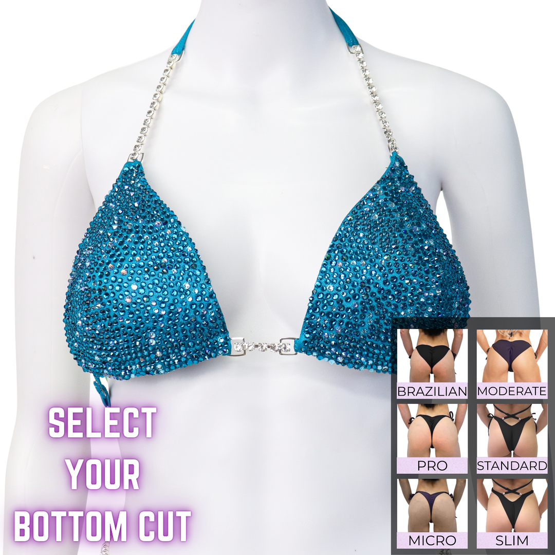 QS SZ: Crystal Radiance. Hologram Turquoise. Medium Molded/Select Your Bottom.  Angel Competition BikinisThe best NPC Competition Suits for the Bikini Division, Fit Model Division Suits, and bodybuilding suits.