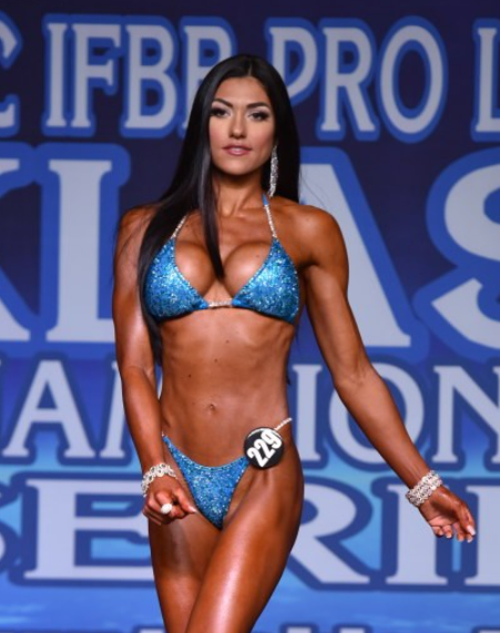  Lauren's Turquoise Radiance, tailored for NPC Bikini or Wellness Competitors. Inspired by Lauren Dannenmiller's iconic suit, this design radiates elegance and confidence. Command the stage and stand out as a true champion in this exclusive creation.