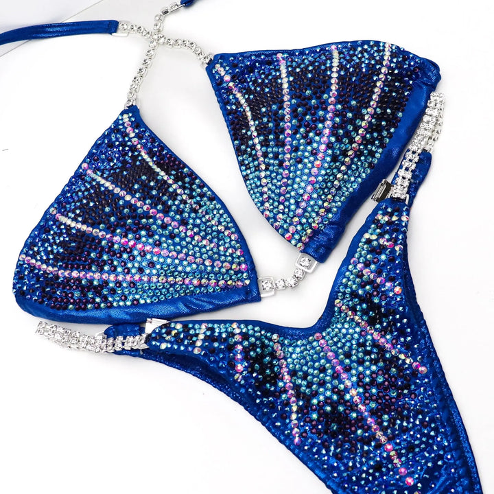 Blue Crystal Galaxy bikini with curved lines and gradient rhinestones designed for figure and wellness athletes.