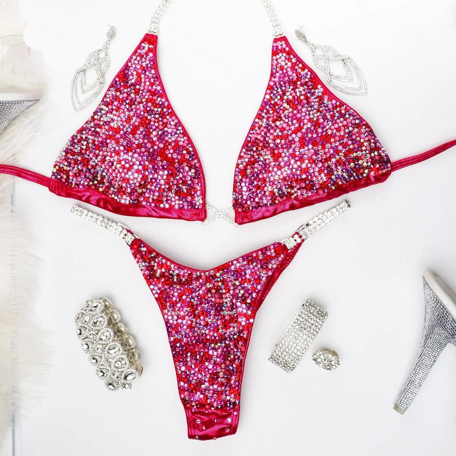 Competition suits for bodybuilders. The best competition suits to make you feel confident on stage are from Angel Competition Bikinis. Competition figure suits for NPC Figure Division. Competition Wellness Bikinis for IFBB. How to become an IFBB Pro in the IFBB Bikini Division or NPC Bikini Division. 