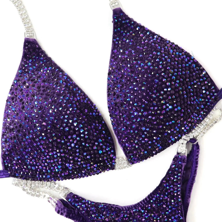 Unleash your power in the **Chrome Eclipse Radiance** competition suit! Soft velvet purple with violet & chrome purple AB crystals for a stunning shine. ✨💜 #Bodybuilding #CompetitionSuit #ChromeEclipse #PurpleRadiance