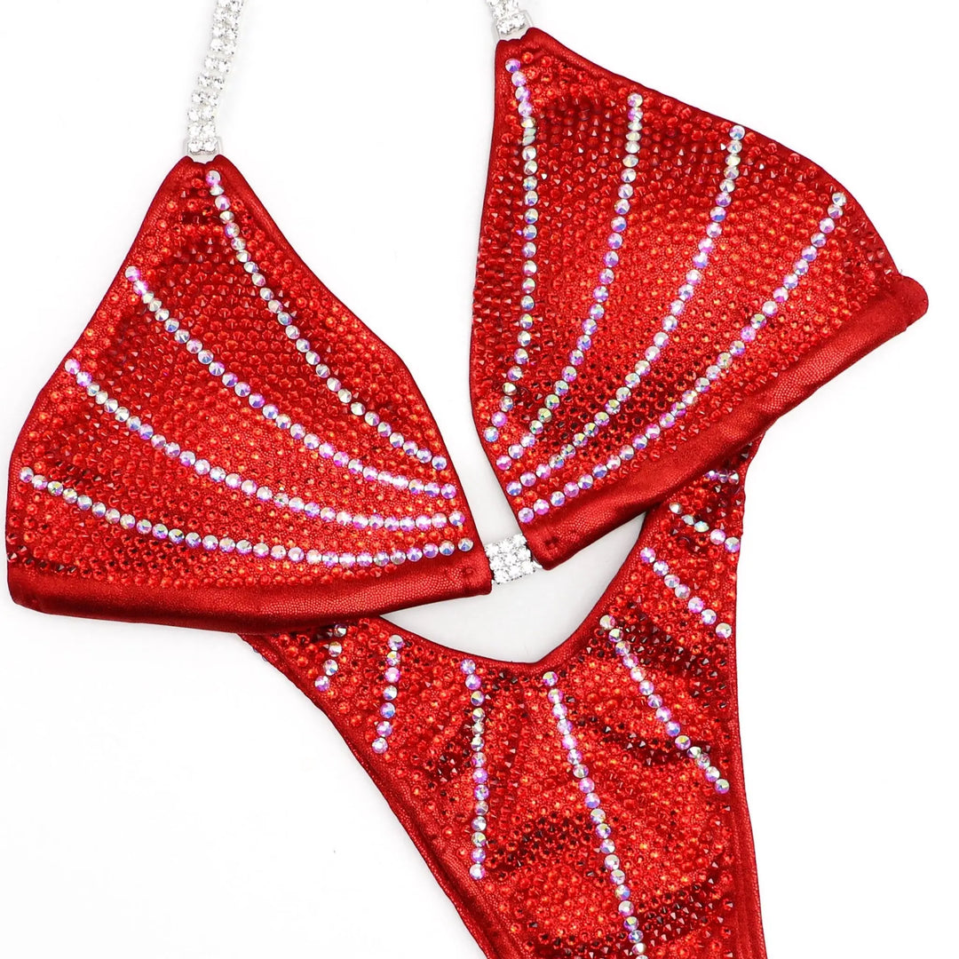 Red custom Crystal Galaxy bikini with curved lines and gradient rhinestone design for figure competition and wellness athletes