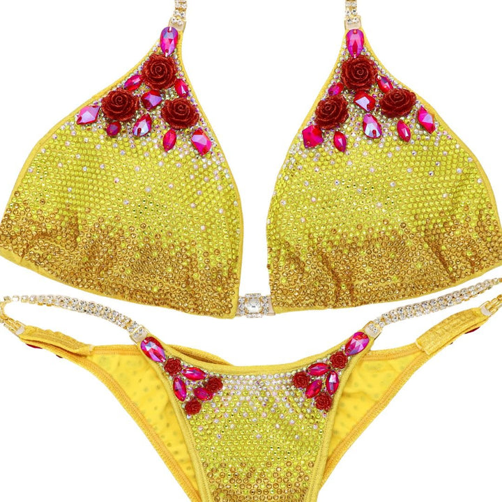 Custom Platinum Gradient yellow competition bikinis with red rhinestone accents for NPC bikini competition suit and figure competition suits