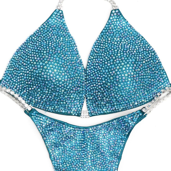 Holly's Deep Aqua Radiance hologram teal competition bikini with aqua and light sapphire AB crystals for bodybuilding suits