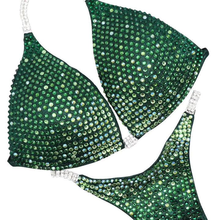 Green custom bikini set embellished with gradient crystal diamonds designed for athletes and figure competitors.