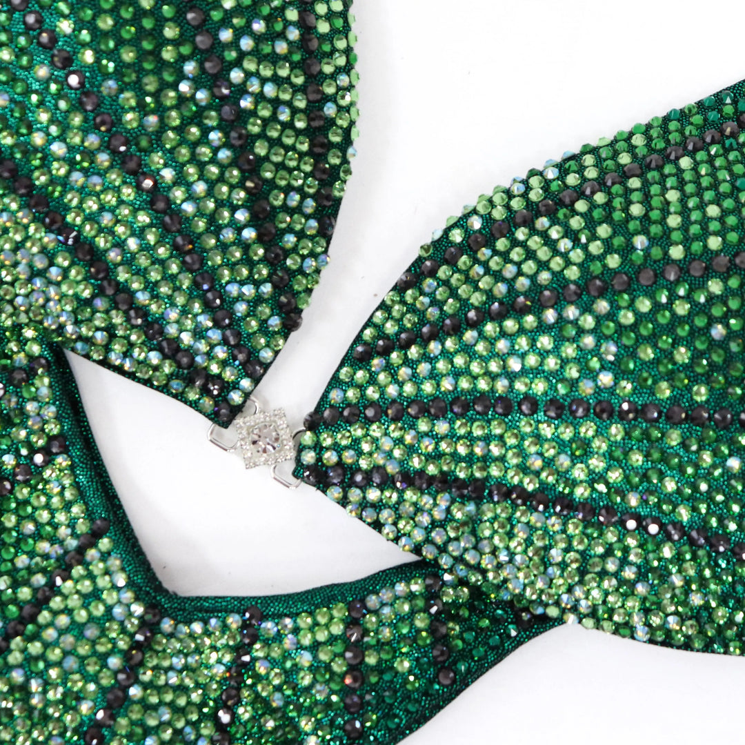 Stand out in the **Green Galaxy** suit! Stunning emerald green with bold green crystals for a powerful, fierce look. ✨💚 #Bodybuilding #CompetitionSuit #GreenGalaxy #BoldAndBeautiful