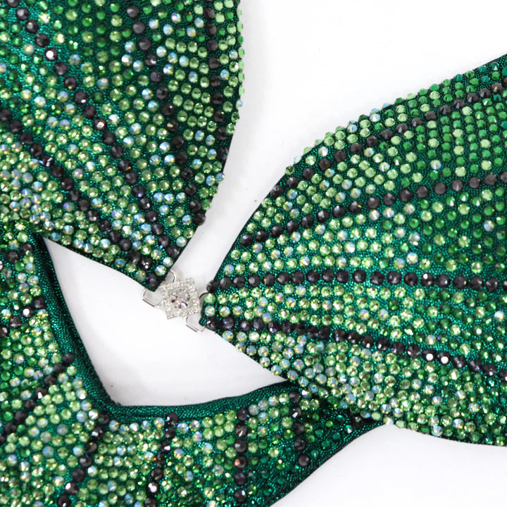 Stand out in the **Green Galaxy** suit! Stunning emerald green with bold green crystals for a powerful, fierce look. ✨💚 #Bodybuilding #CompetitionSuit #GreenGalaxy #BoldAndBeautiful