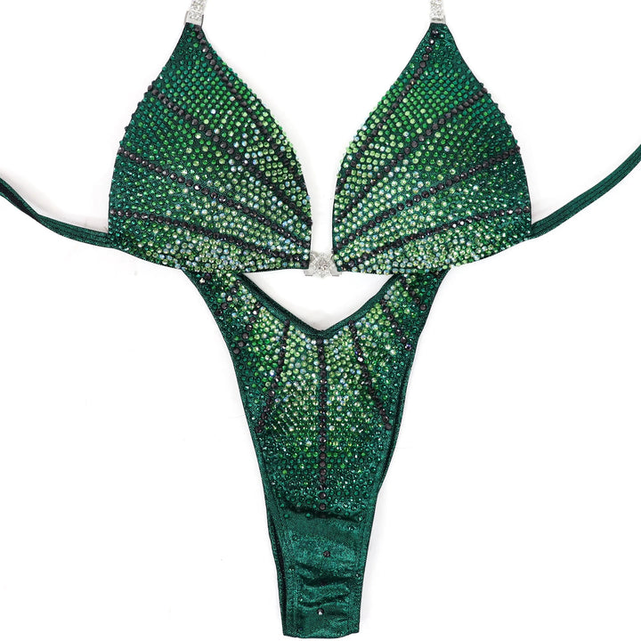 Stand out in the **Green Galaxy** suit! Stunning emerald green with bold green crystals for a powerful, fierce look. ✨💚 #Bodybuilding #CompetitionSuit #GreenGalaxy #BoldAndBeautiful