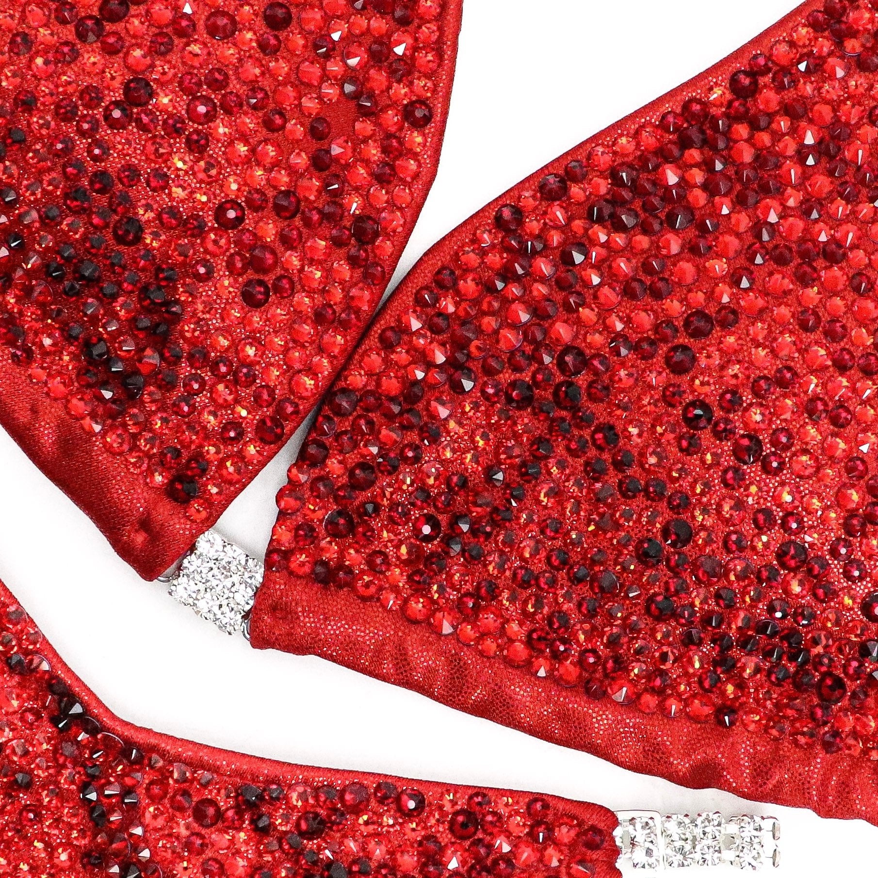 Introducing Lawna's True Red Radiance suit, a fan favorite among female bodybuilders! 💪❤️ Sparkle and shine on stage with this stunning red ensemble. #Bodybuilding #CompetitionSuit #FemaleAthletes 🌟