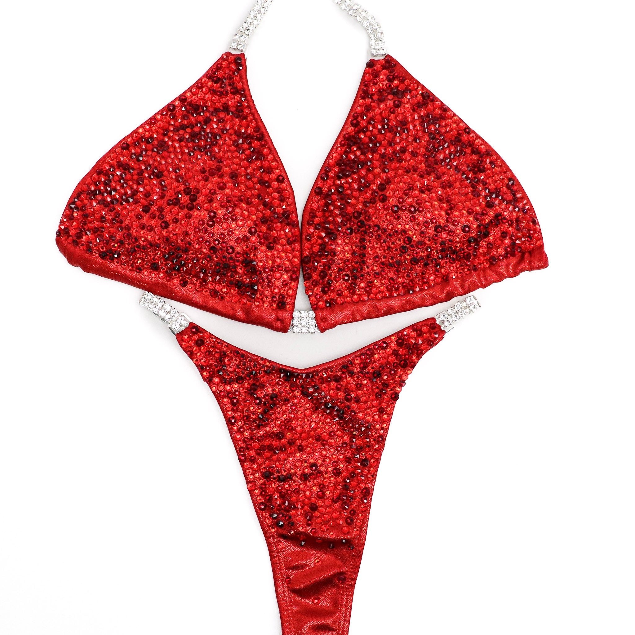 Introducing Lawna's True Red Radiance suit, a fan favorite among female bodybuilders! 💪❤️ Sparkle and shine on stage with this stunning red ensemble. #Bodybuilding #CompetitionSuit #FemaleAthletes 🌟