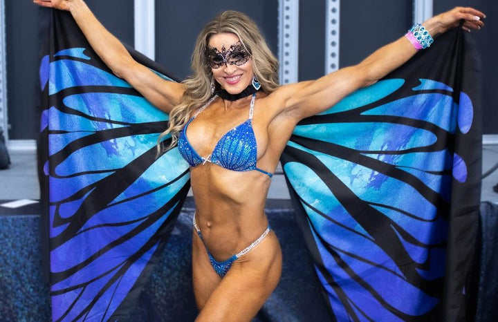 Introducing Ocean Cosmo 🌊! This turquoise competition suit for female bodybuilders boasts a stunning blue gradient in a beautiful design that guarantees you'll stand out on stage 💫. Elevate your presence with elegance! #Bodybuilding #CompetitionSuit #OceanCosmo 💙👙🌟