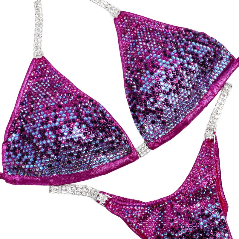 Introducing Purple Mulberry Gradient 💜! This exquisite mulberry competition suit showcases a stunning gradient of purple and pink crystals, making it truly unique and eye-catching. Stand out on stage with elegance and flair! #Bodybuilding #CompetitionSuit #PurpleMulberryGradient 👙💎🌟