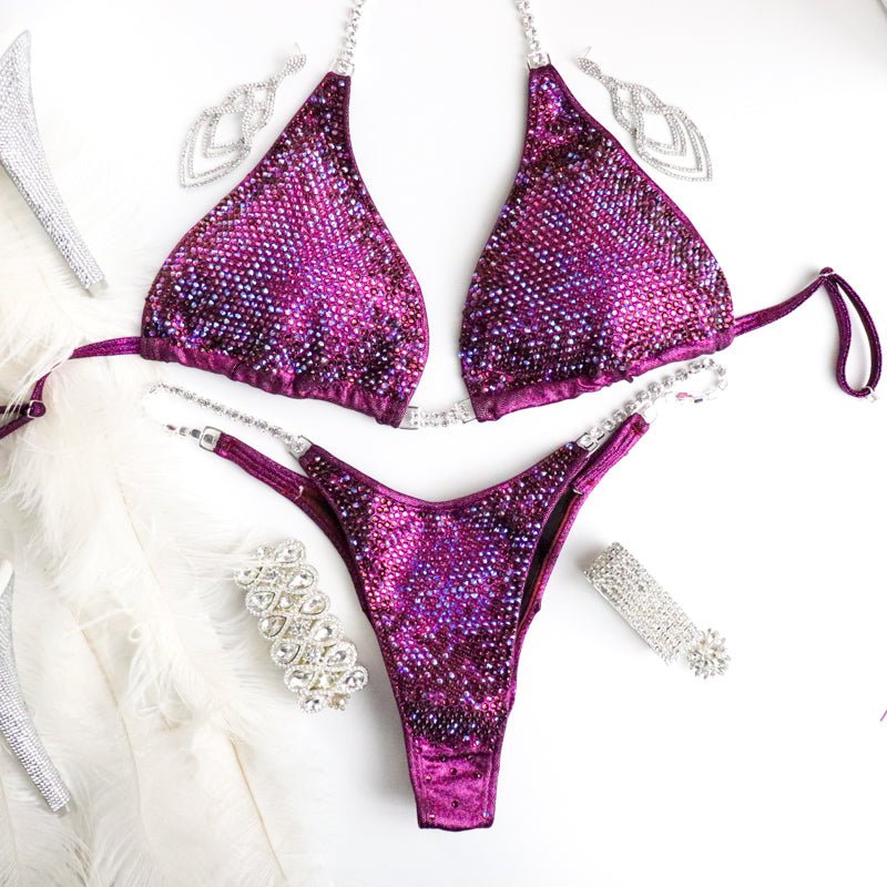 Introducing Savana's Cranberry Nova: a striking cranberry suit adorned with abundant fuchsia crystals and a touch of violet. Designed in collaboration with Savana Sharp, this stunning creation guarantees to dazzle under the stage lights, showcasing your strength and elegance effortlessly. 💎✨ #BodybuildingFashion #CranberryNova #FitnessCompetition