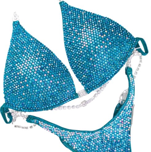 Introducing the Teal Nova competition suit, a stunning teal masterpiece adorned with Aqua AB, Crystal AB, Emerald AB, and Blue Zircon crystals. ✨🌟 Perfect for female bodybuilders seeking elegance and class on stage. Elevate your presence with this exquisite blend of sparkle and sophistication! #Bodybuilding #CompetitionSuit #TealNova #FemaleAthlete