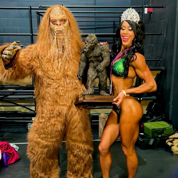 Introducing Ashley's Grasshopper Nova, a stunning replica of Ashley Kaltwasser's suit at the NPC Northern Classic IFBB Sasquatch. Featuring mesmerizing emerald and green hues, this suit ensures you shine like a champion on stage. Elevate your presence with its striking design, a true standout for competitors.